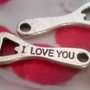 2 CIONDOLI CHARM APRIBOTTIGLIA SCRITTA I LOVE YOU IN ARGENTO TIBETANO - AMORE