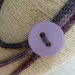 Collana in cotone biologico sfumata lavorata a tricotin con bottone tono su tono