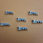 6 Floating charms 'Love' argentati