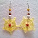 orecchini pendenti in cotone giallo fatti a mano ad uncinetto