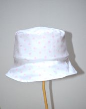 Cappello modello pescatore in cotone con pois rosa