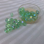 Perle di vetro iridescente, scatola di 50 pezzi