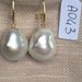 Orecchini con ganci argento 925 e perle barocche.