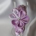 Cerchietto con fiore Kanzashi lilla
