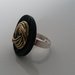 anello con bottoni vintage nero con fili dorati