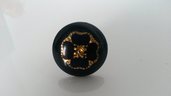 anello con bottone vintage nero con fiore dorato