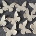 10 Farfalle fustellate in feltro beige