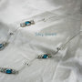 Collana catena cobra con perle argentate e azzurre