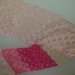 Sciarpa in lana rosa ad arcate