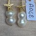 Orecchini con ganci in argento 925, perle double e stelle marine dorate.
