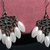 Orecchini chandelier con perle ovali