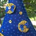 Natale - albero tessuto blu con decorazioni dorate