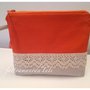 Pochette bicolore in cotone arancio/ecrù  con pizzo