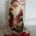 candela decorata con Babbo Natale