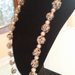 Collana con palline all'uncinetto e perline nere/bianche/lurex argento