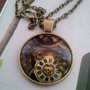 COLLANA OTTONE CON CABOCHON OROLOGIO IN RESINA 