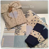 Set tovagliette patchwork in cotone sui toni azzurri ed ecrù con tovagliolo,portatovagliolo e sacchettino
