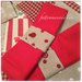 Set tovagliette patchwork in cotone su toni rossi/ecrù con tovagliolo,portatovagliolo e sacchettino