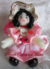 Bambola in pasta di mais (rosa) 