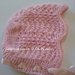 Cuffia  per neonata in lana rosa