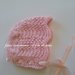 Cuffia  per neonata in lana rosa