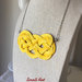 Collana con nodo marinaresco decorativo giallo, handmade, con pasta polimerica, pezzo unico. Acciaio Inox. SmallArtHandmade - Small Art
