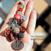 Collana lunga con pendaglio rosso e arancione country chic