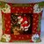 Cuscino Babbo Natale con i doni in patchwork fatto a mano