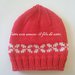 Cappello in lana merinos rossa con disegni bianchi