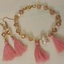 Orecchini e bracciale con nappine rosa e cristalli color champagne