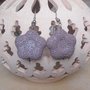 Orecchini pendenti in pietra pomice viola forma fiore