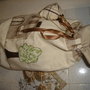 sacchetto in stoffa con applicazioni a mano
