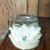 Barattolo in vetro decorato in stile vintage con juta fiocco in juta e strass centrale con trina in pizzo all'uncinetto serie The old vintage jar
