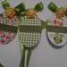 Uova Pasqua portatovaglioli con fiocchetto verde e fiorellini gialli decorazioni tavola feste