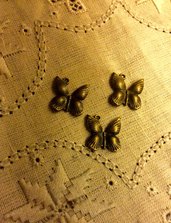 Ciondolo farfalla color bronzo antico