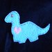 Dinosauro celeste con brillantino