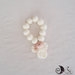 bomboniera prima comunione rosario con angelo bianco per bimba e cuoricino perlescente oro