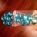 Grande perla in plastica trasparente azzurro 