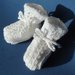 scarpine da neonato in lana seta bianca con treccine traforate
