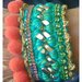 Braccialetto in catena oro, uncinetto swarosvki passamaneria verde azzurro, corallo,beje