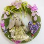 Ghirlanda con coniglietta, fiori e cuore
