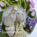 Ghirlanda con coniglietta, fiori e cuore