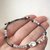 Bracciale unisex cordoncino con pepite smussate e pepita grande centrale in argento 925