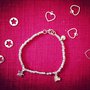 Bracciale pepite martellate piccole con ciondoli in argento 925