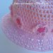 Cappello rosa in cotone con fiori rosa e fucsia 