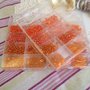 800 perline di vetro nelle sfumature di arancione in contenitore