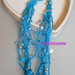 Collana all'uncinetto con fili e perline color azzurro turchese