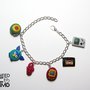 Bracciale anni 90|ciondoli anni 90|ciondolo game boy|ciondolo tamagotchi|ciondolo ciuccio|ciondolo yoyo|ciondolo musicassetta|ciondolo furby