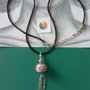 COLLANA DI SETA CON CIONDOLO SFERICO ROSA E COLOR ARGENTO