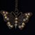 Ciondolo bronzo antico farfalla con strass nichel free
